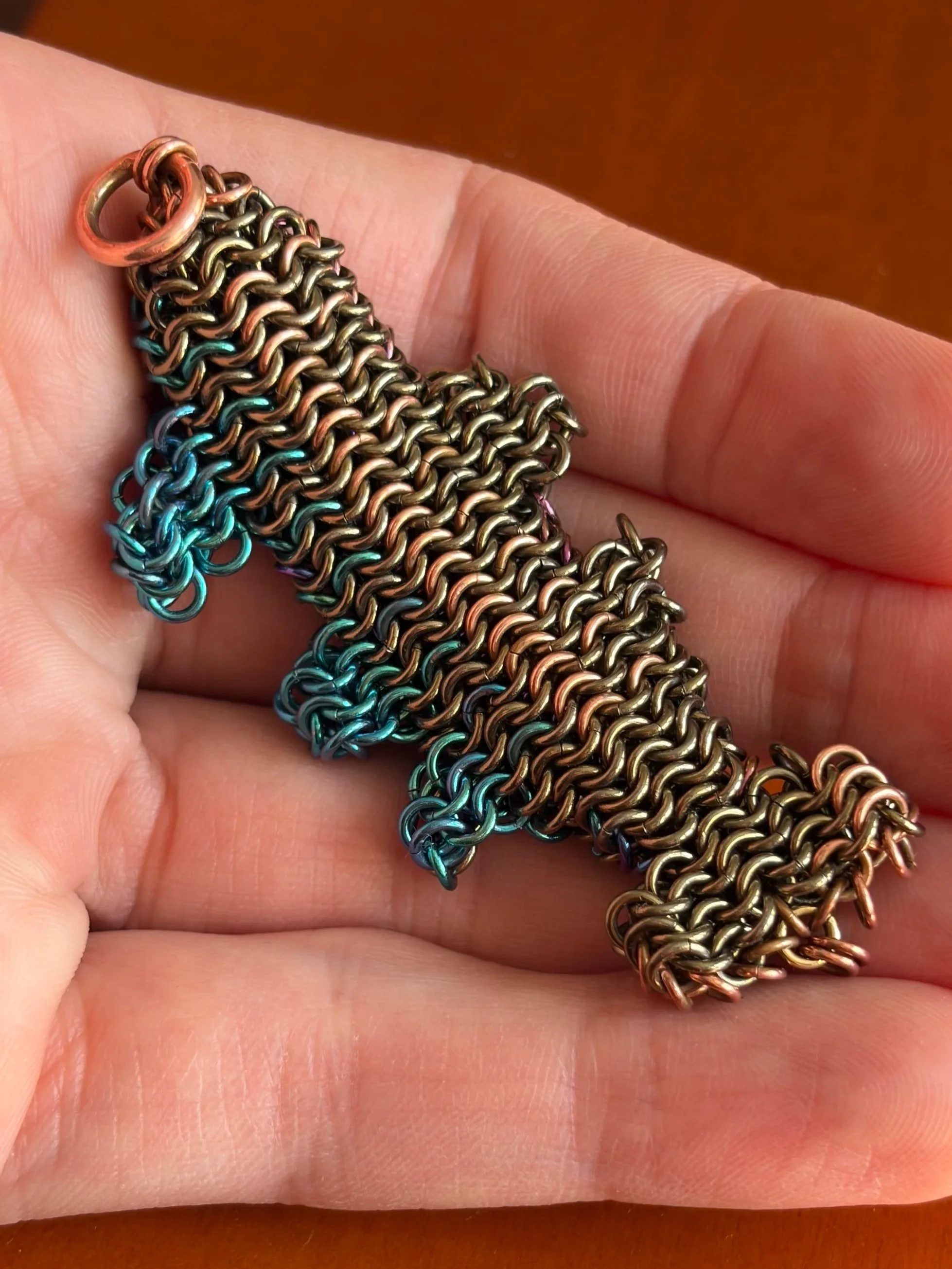 Handheld metal fish sculpture detail Dream Trout series