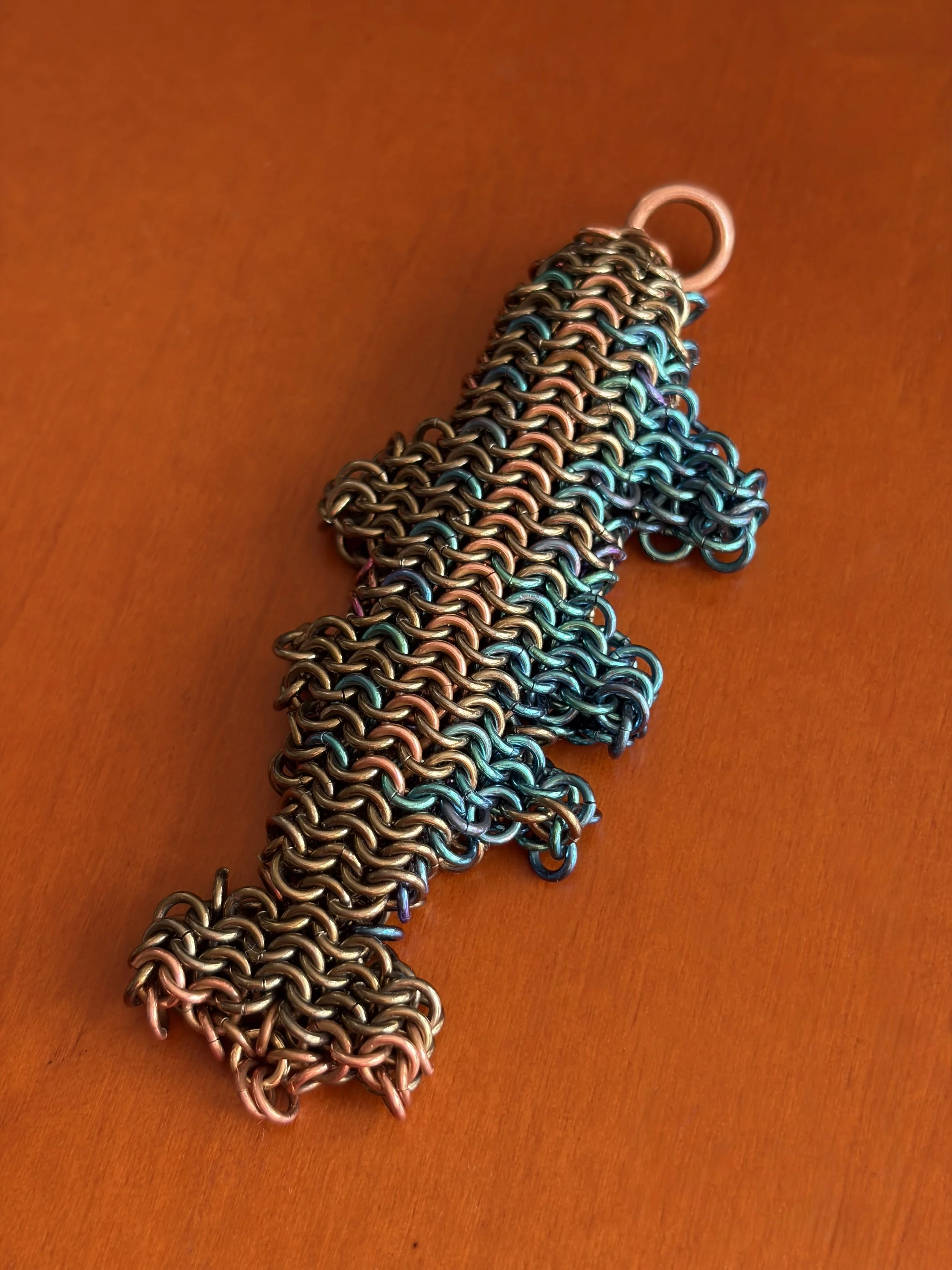 Dream Trout woven niobium copper sculpture detail