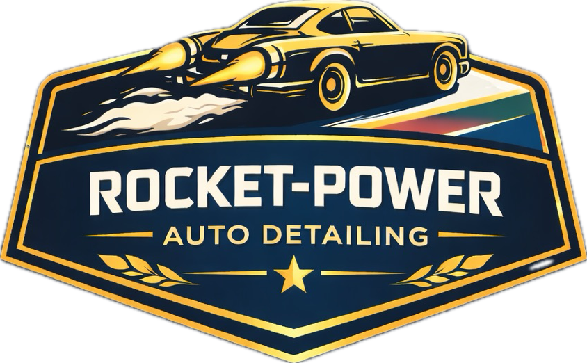 Logo for Rocket-Power Auto Detailing featuring a stylized black and yellow rocket car with flames, with the text "Rocket-Power Auto Detailing" on a dark blue shield-shaped background with gold accents.