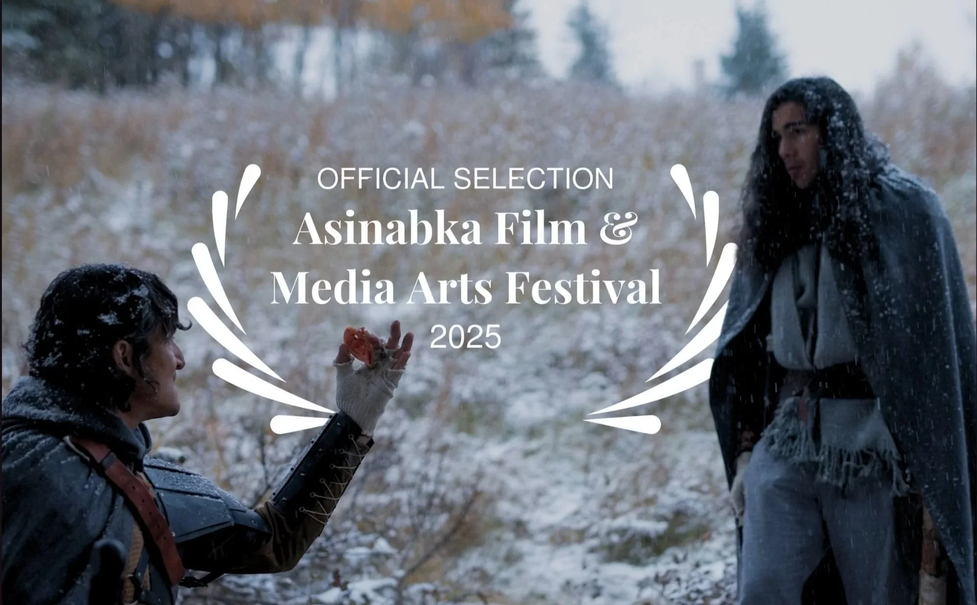 Scene from H&HA showing two fantasy-style characters in a snowy outdoor setting. An older and younger man facing off, the older holding something in his hand. Overlaid laurel of official selection at the Asinabka Film & Media Arts Festival in 2025.