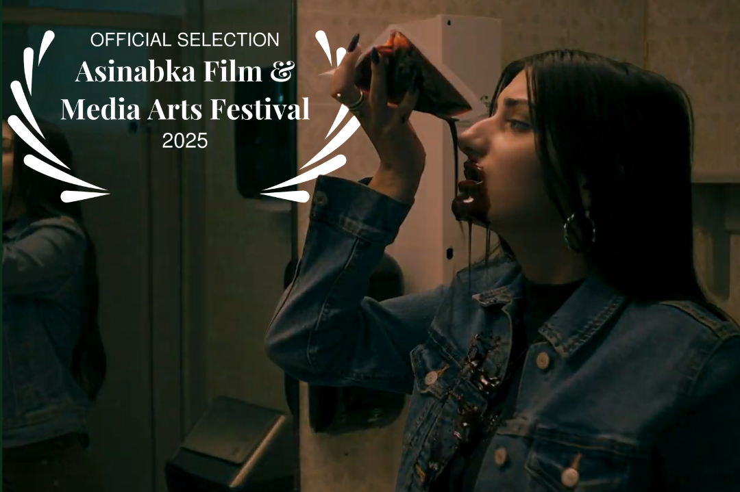 Scene from Immortal Embrace showing a young woman in a denim jacket holding a blood bag near her mouth, with red drips down her face, with an overlay laurel for the Asinabka Film & Media Arts Festival 2025.
