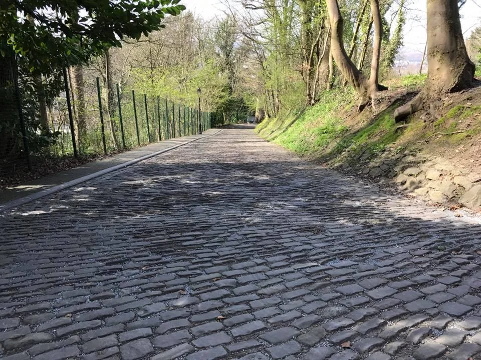 This is the section that precedes the church before it funnels riders between a fine drinking establishment and onto the church section. Zoom in to see how some of these cobbles are like upward facing blades!!