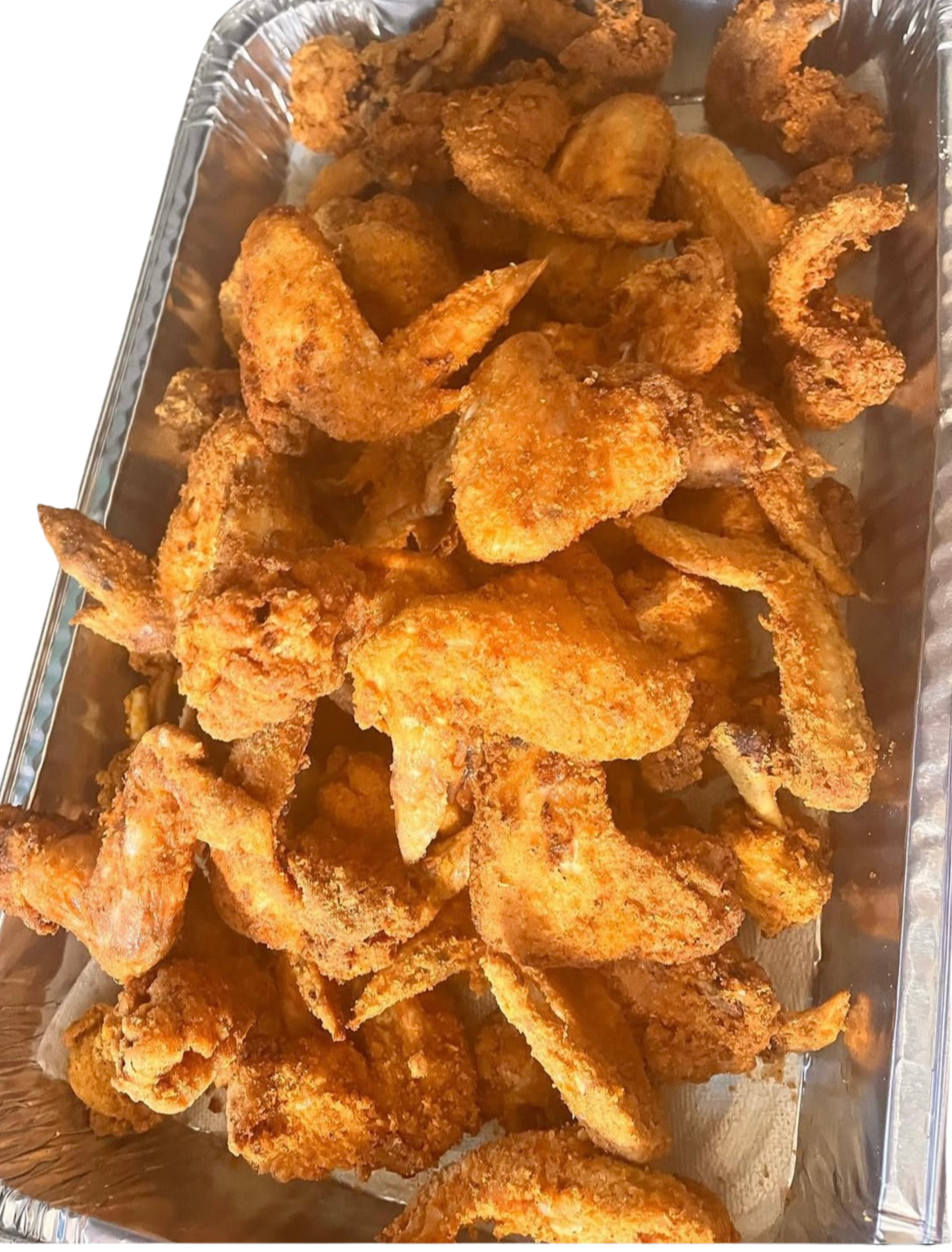 Fried chicken wings in a foil tray.