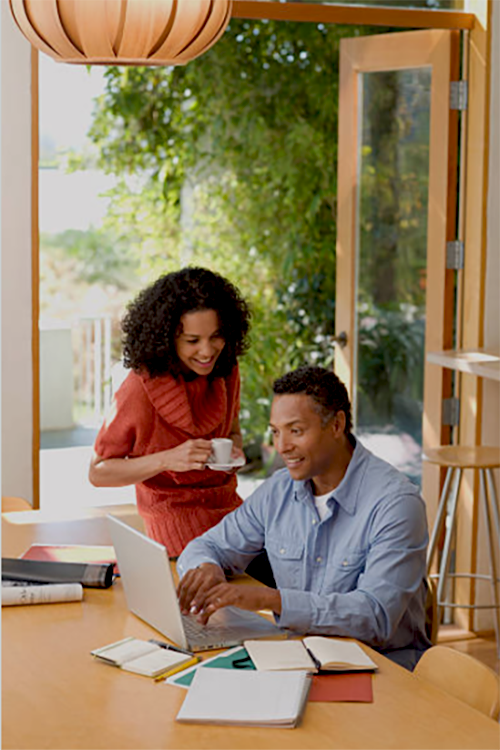 Advisor meeting with clients over a video call.