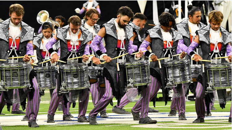 Drummers of the canton marching band in a group and wearing uniforms