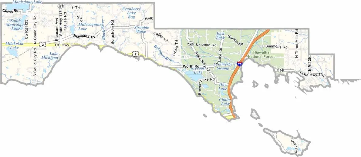 Map of Manistique Lake and surrounding area in Michigan, showing roads, lakes, and landmarks like Hiawatha National Forest.