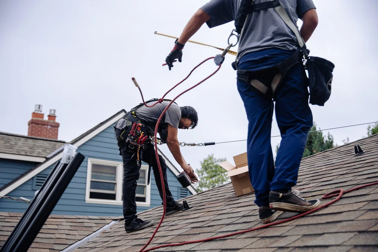 men on roof