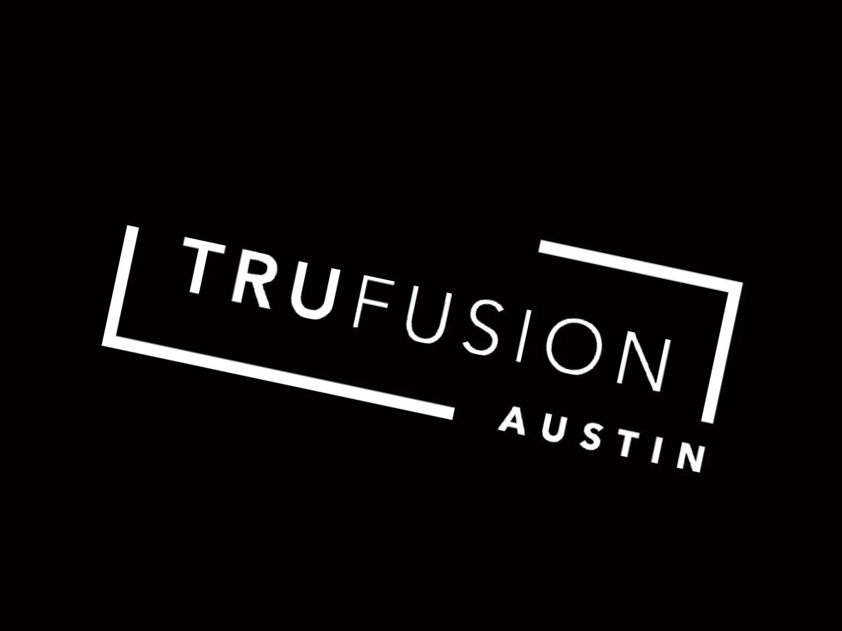 Logo for TRUFUSION Austin with black background and white text, featuring a geometric border.