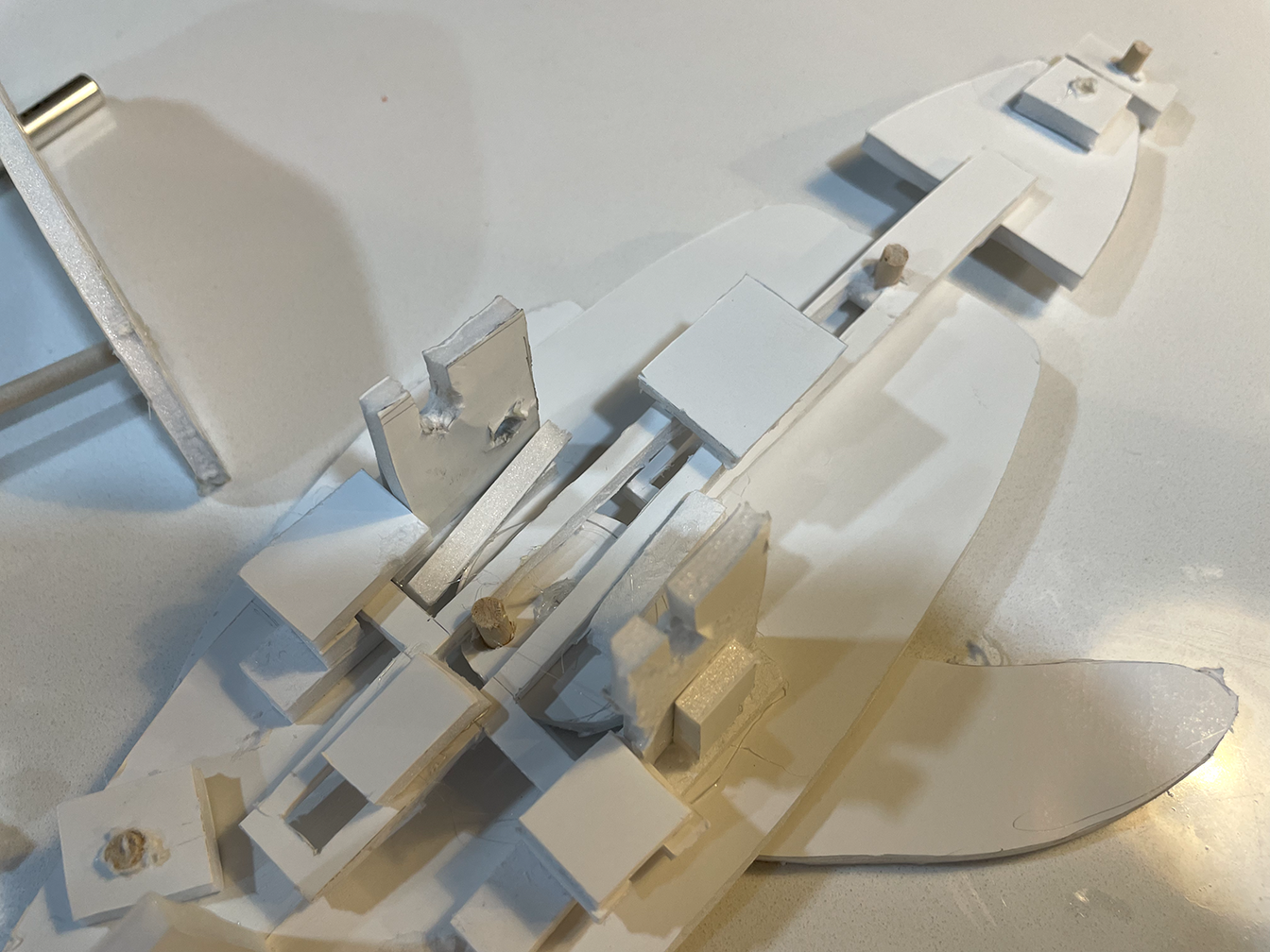 The first mockup of the mechanism, made in foam core; while it functioned, it was weak and showed that mechanical sections needed reinforcement