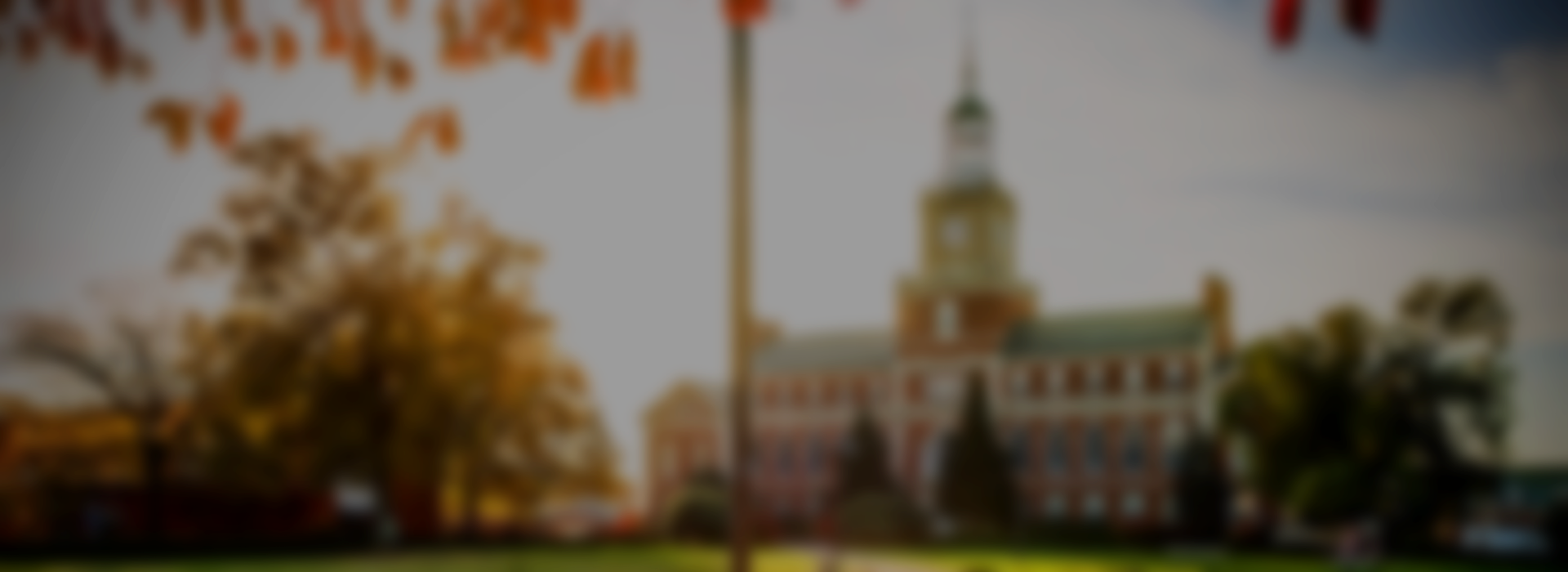 Blurry image of Howard University's Founders Library during the day time.