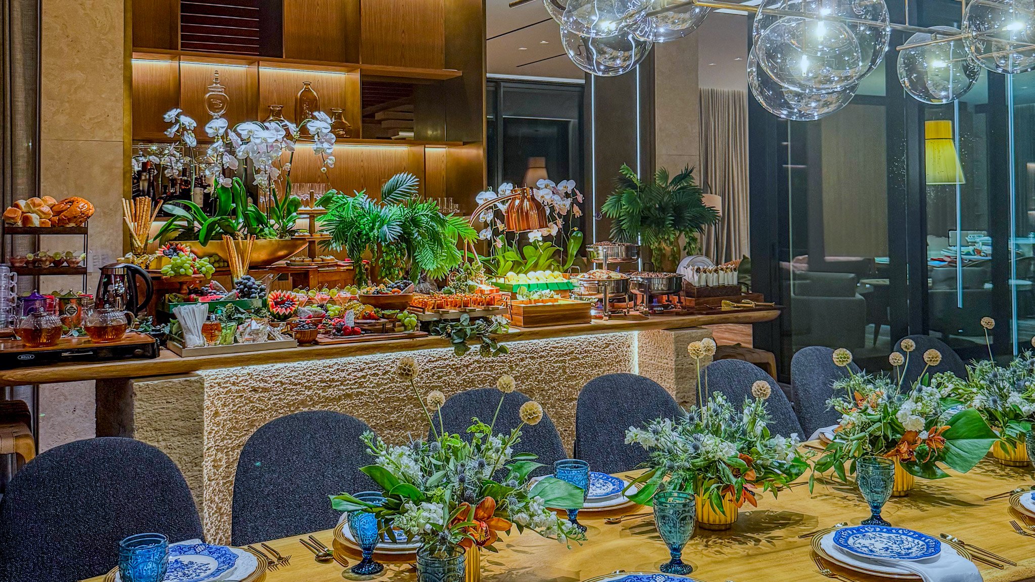 Luxury private dining event catered by Francesca’s Catering in Miami featuring elegant table settings and gourmet buffet display.