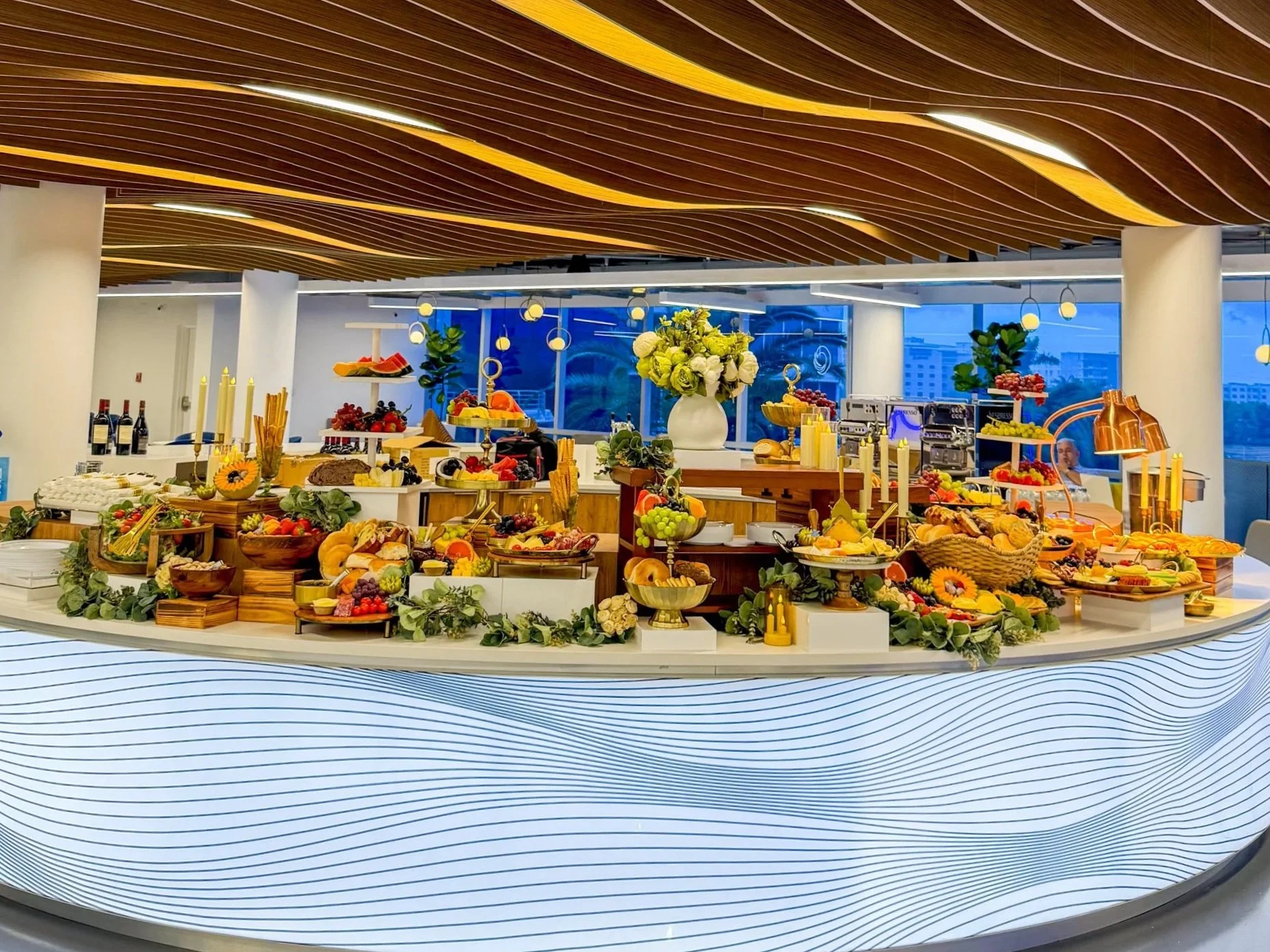 Corporate event buffet by Francesca’s Catering in Miami featuring gourmet grazing stations and elegant modern presentation.