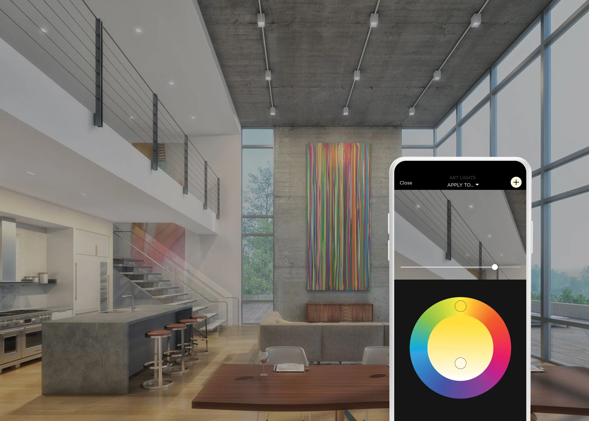 Modern open-concept living space with high ceilings, large windows, colorful abstract art on a concrete wall, a kitchen island with stools, and a smartphone controlling art lighting with a color wheel interface.