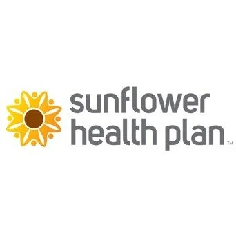 Sunflower health plan logo with a stylized sunflower icon and gray text