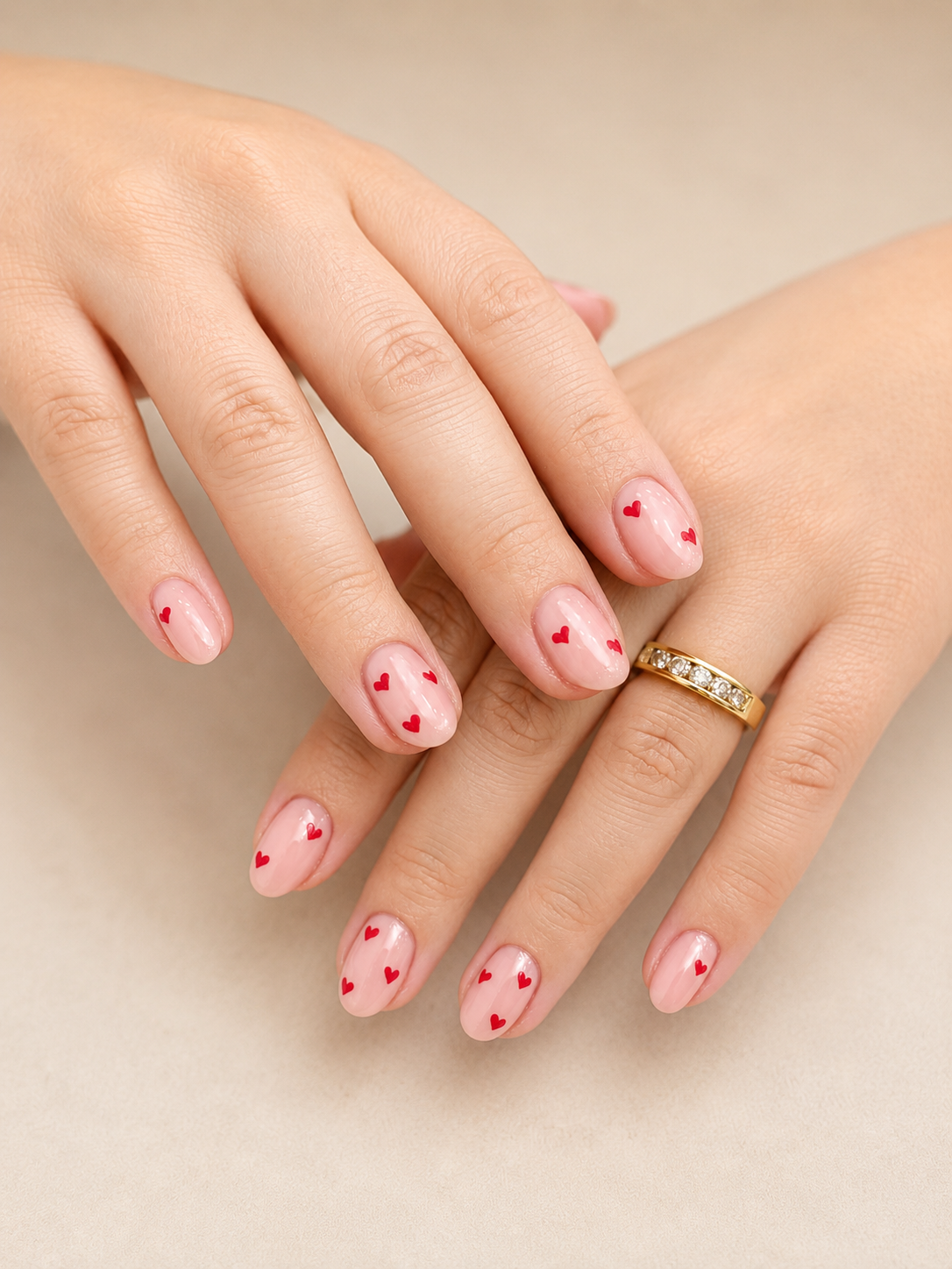 Cute heart nail art gel manicure on natural nails at Glam & Go Salon in JVC Dubai