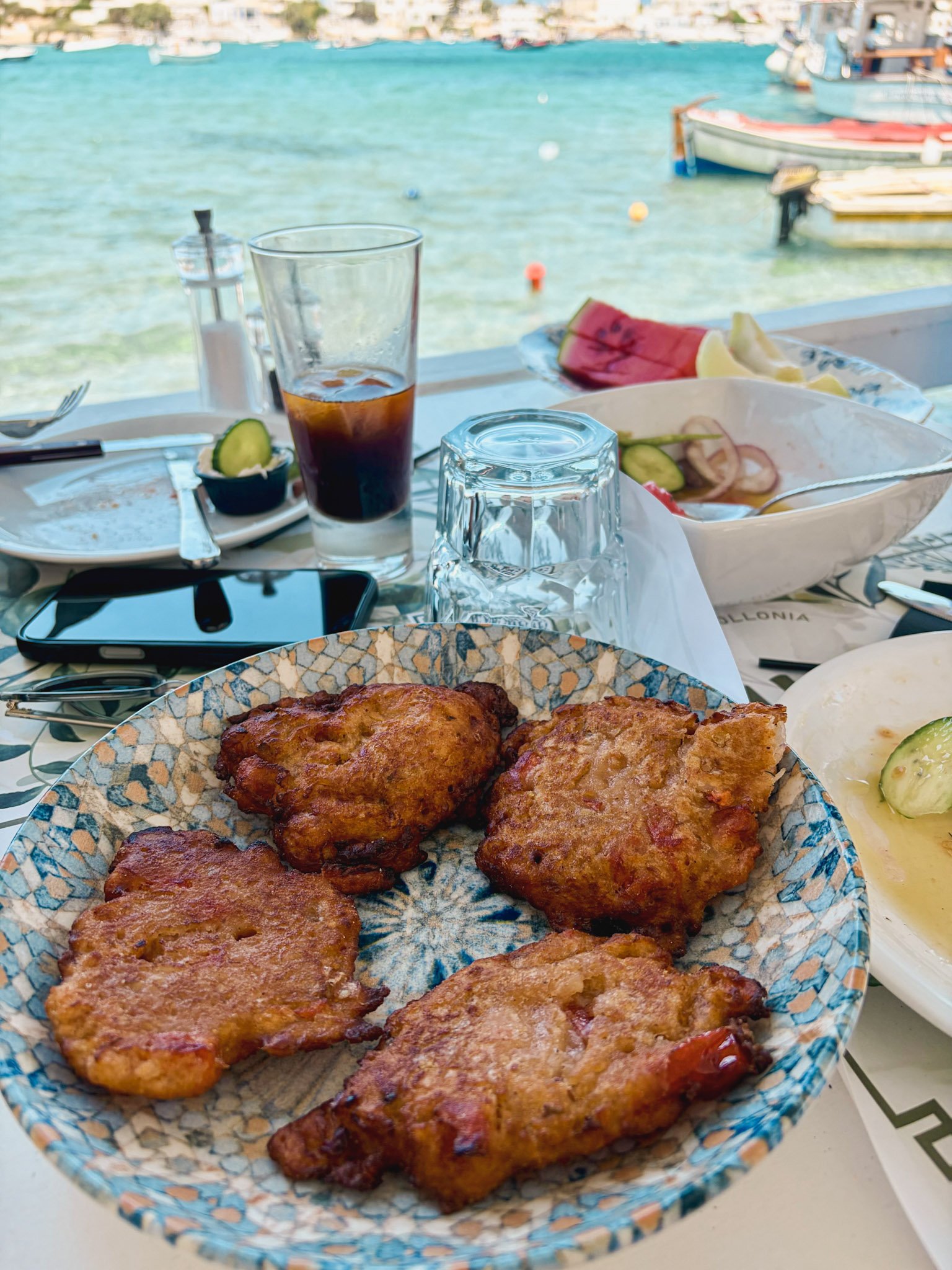Tomato fritters and salad for breakfast.