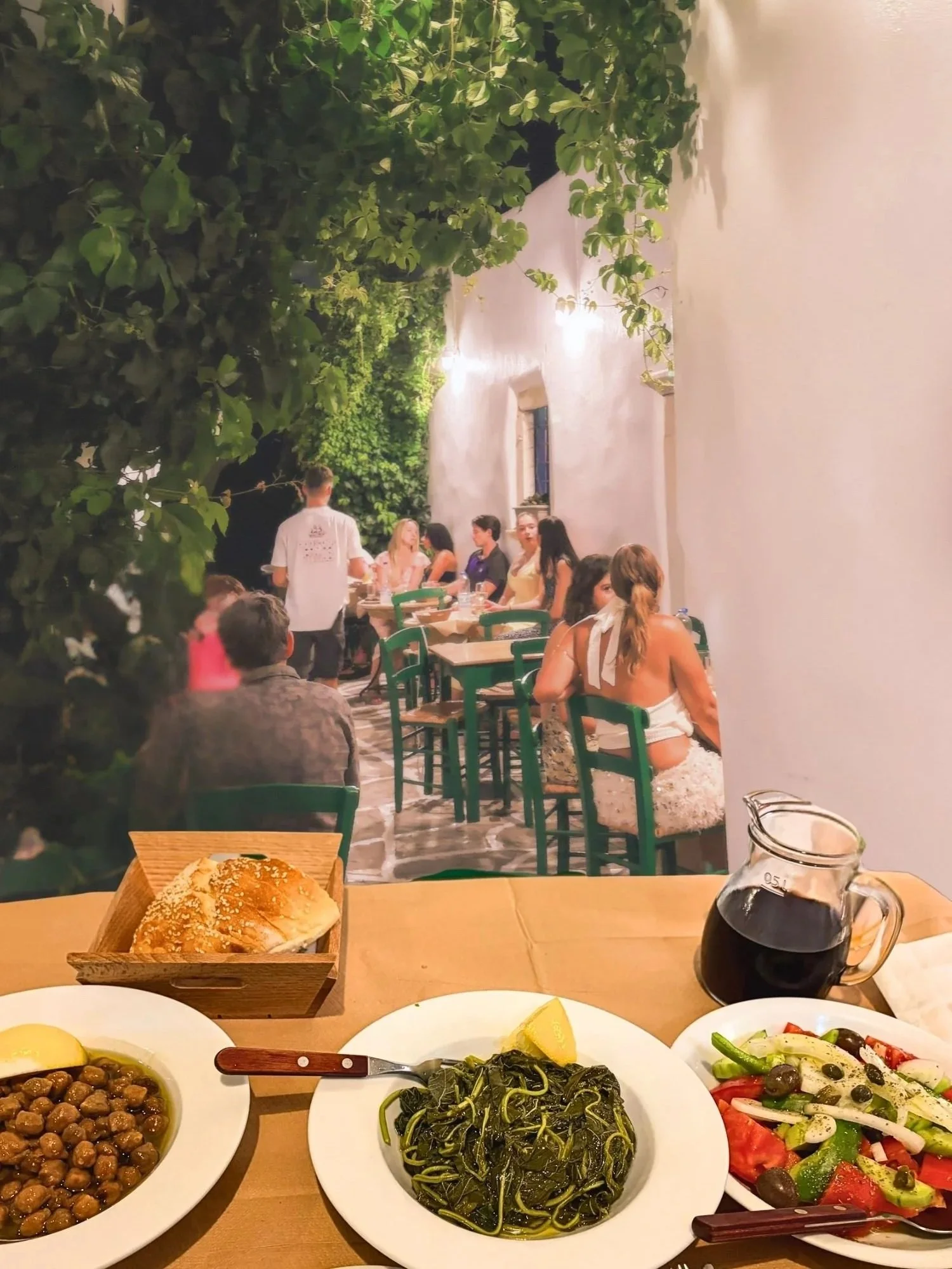 Homestyle food in a quintessential whitewashed alley: stewed chickpeas, boiled wild greens, and horiatiki.