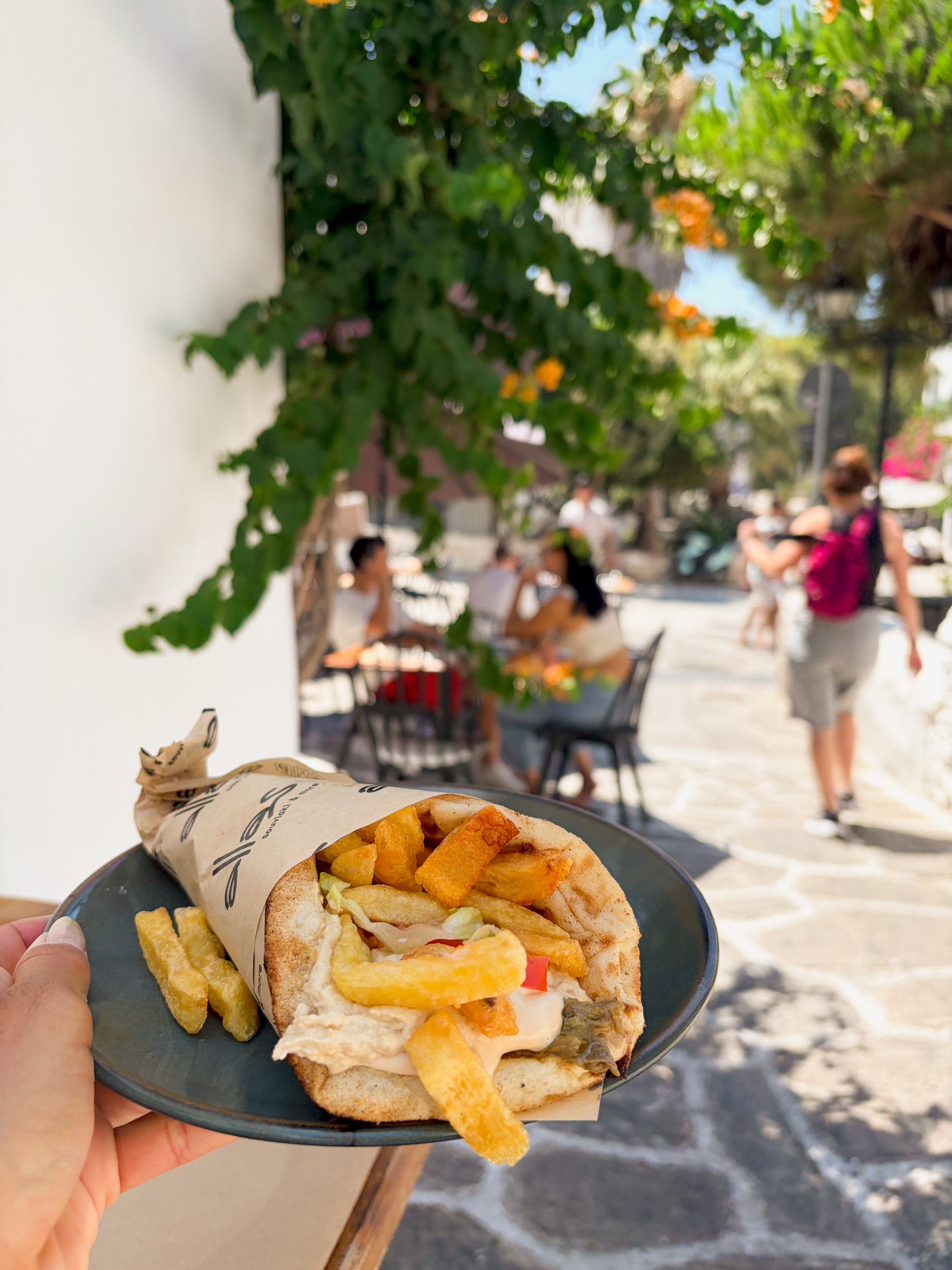 My first stop in Paros, I ran to Alla Souvlaki because I heard they served oyster mushroom gyros. I know all you see are the fries but inside = 10/10.