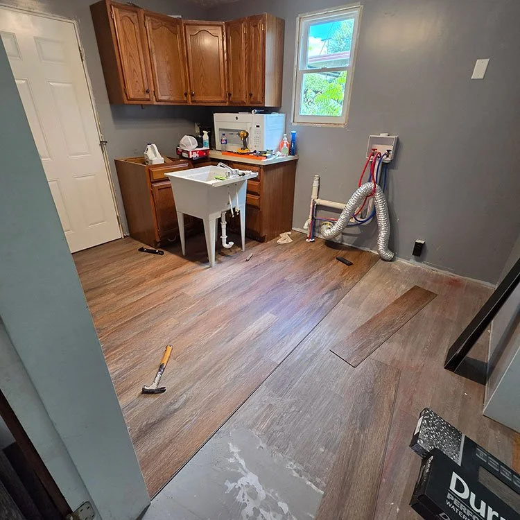 During: Floor Replacement - Laundry and Kitchen