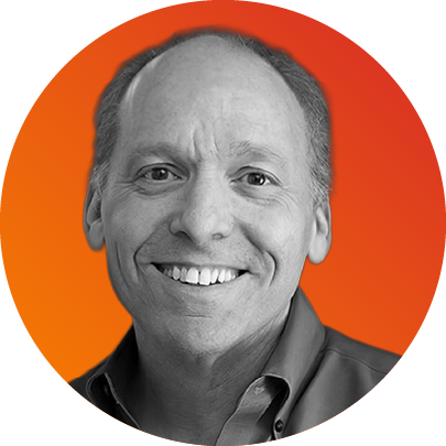 Black and white portrait of a smiling middle-aged man with short hair, wearing a collared shirt, set against an orange background.
