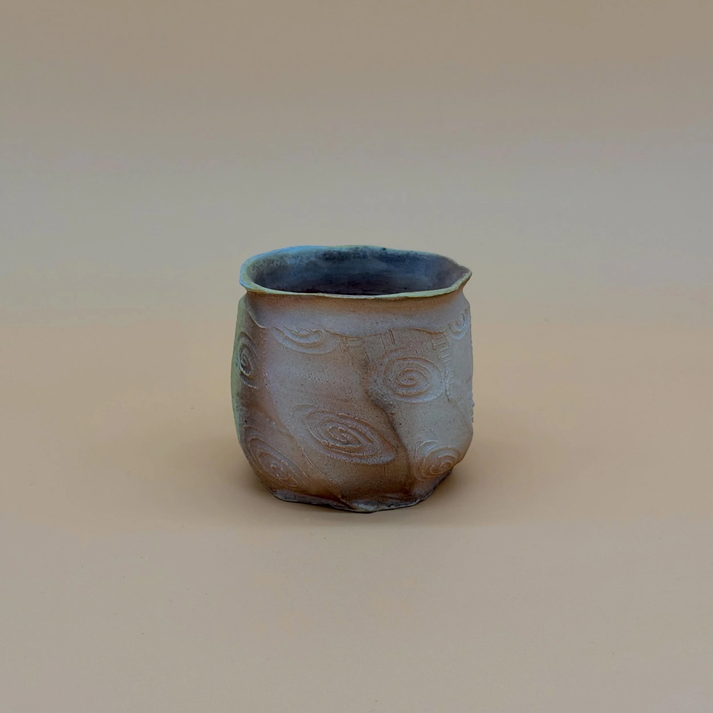 faceted spiral cup

last of the faceted cups. i think i might be keeping this one for myself