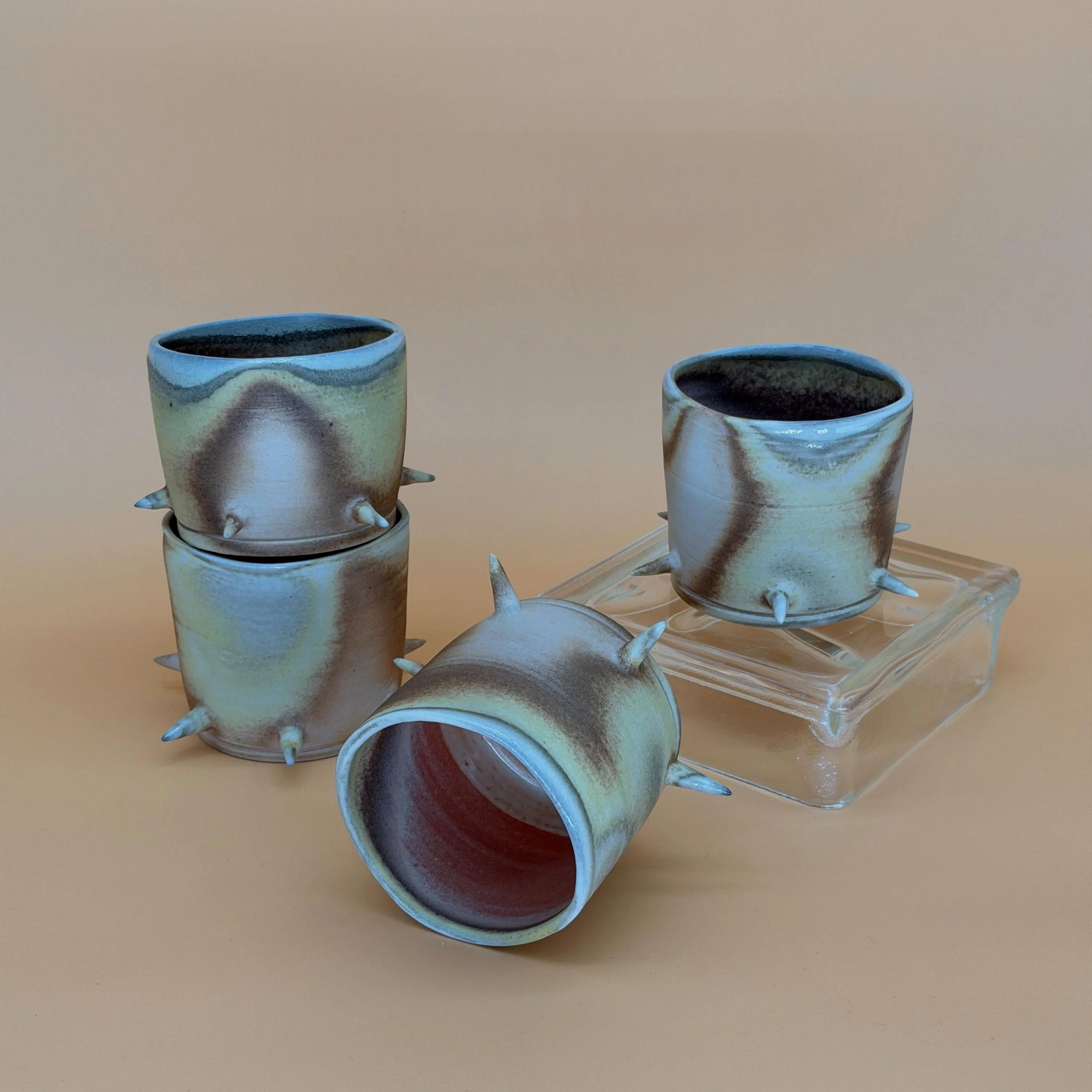 spiked and squared cups &bull; 12oz

i bet yall were wondering when the spikes would make an appearance. very, very in love with how the firing accentuated my throwing lines.