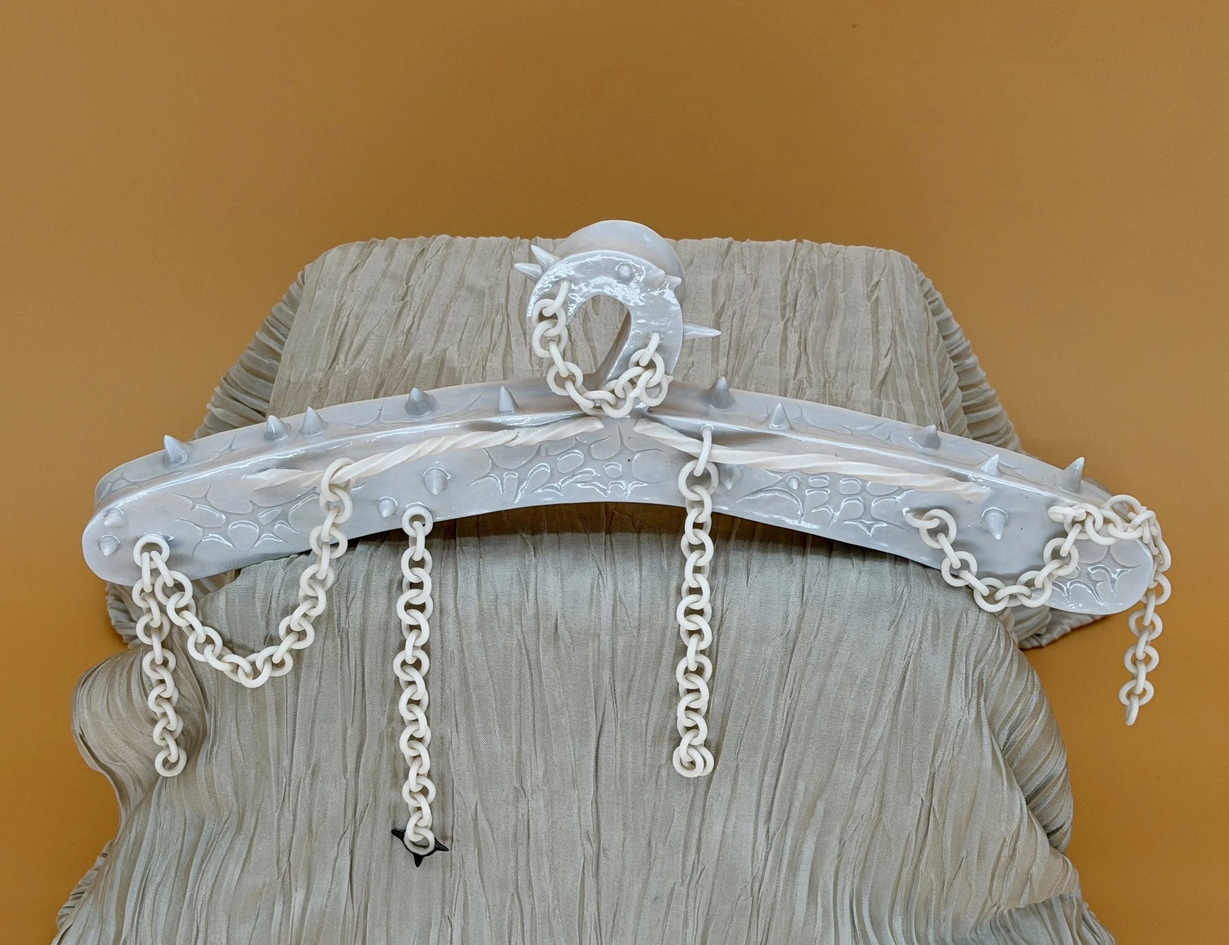 hanger for delicate items
may 2026

porcelain. intended for hanging display