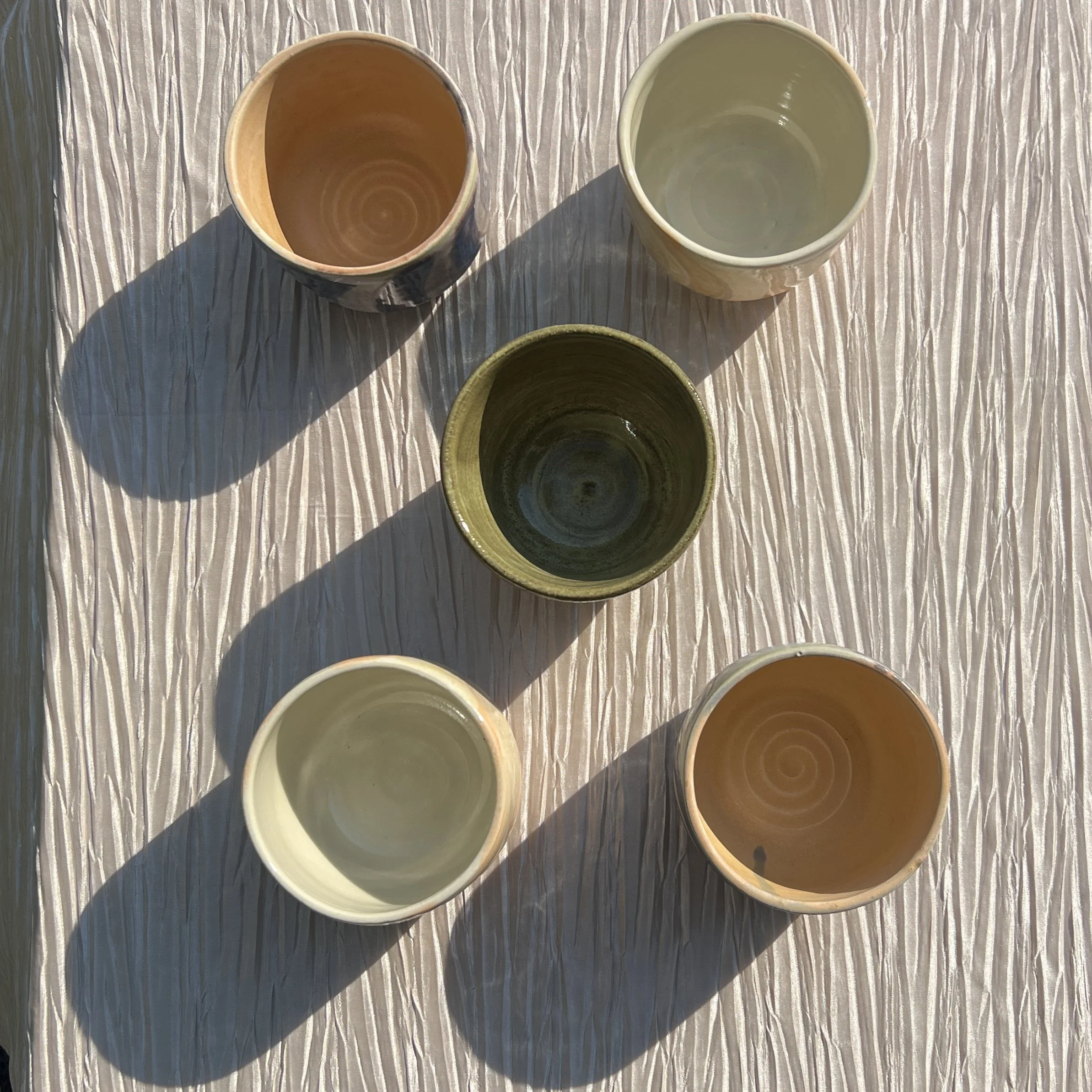 spiral cups (top-down view)
august 2025

stoneware