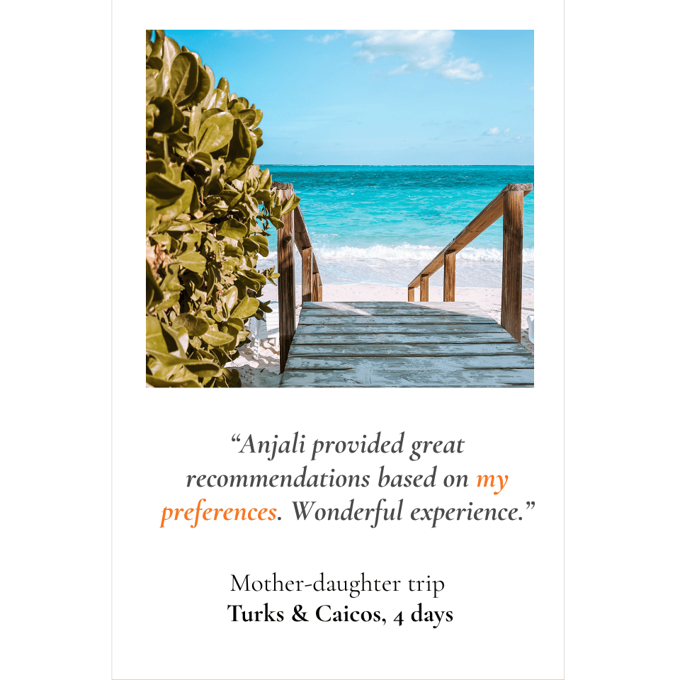 Wooden pier leading to a turquoise-water beach at Grace Bay Resorts in Turks and Caicos — testimonial from a mother-daughter trip