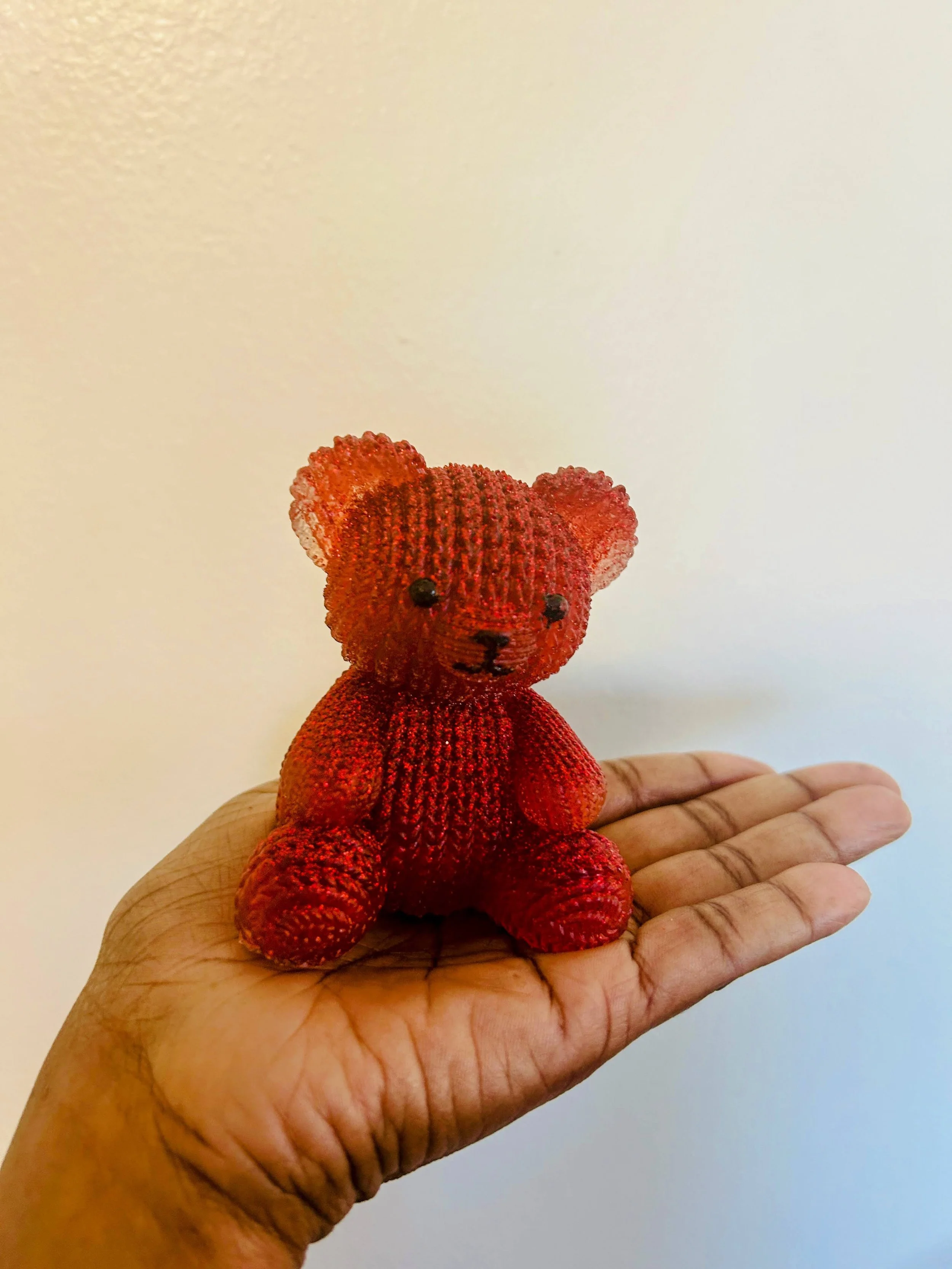 red bear in hand.jpg