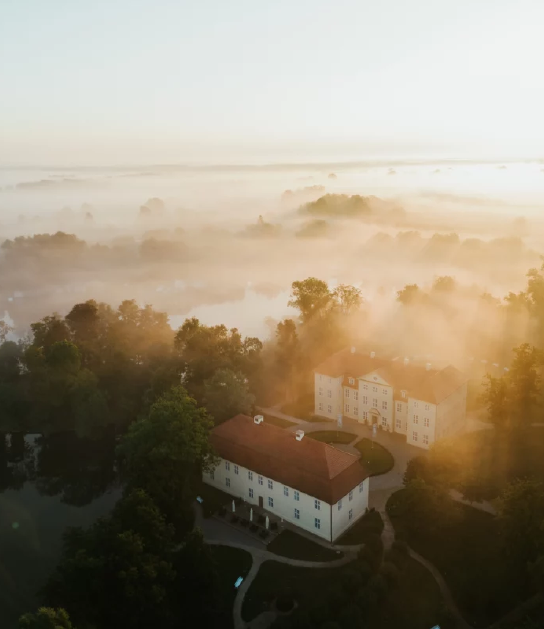 Overhead image of Mirow Castle of Mecklenburg-Strelitz in sunny fog