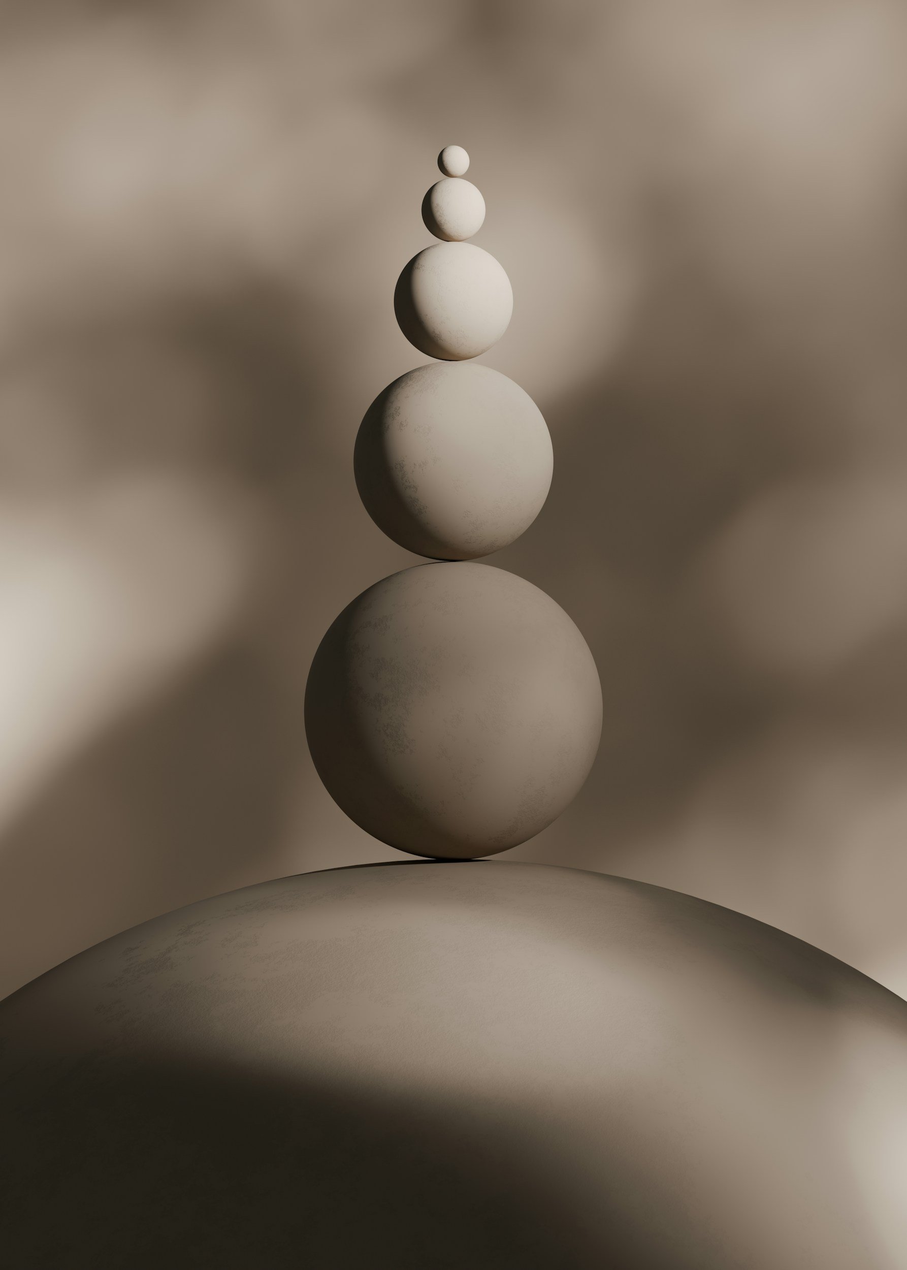 A symmetrical arrangement of seven white spheres, stacked vertically from largest at the bottom to smallest at the top, on a smooth curved surface with soft, diffuse lighting and a neutral background.