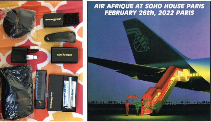 Une collection d'objets personnels pour le voyage, y compris un chargeur, une brosse à cheveux, un rasoir électrique, un chargeur USB, un étui à lunettes, et des vêtements de vêtements, à côté d'une affiche pour un événement à Paris le 26 février 2022 concernant Air Afrique au SoHo House.