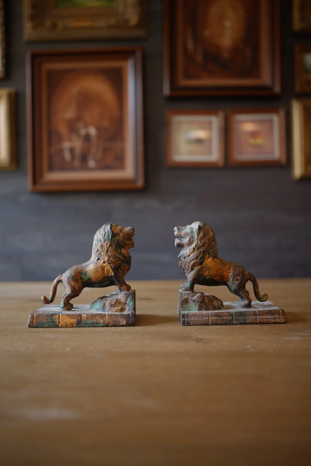 Pair of Gilt and Verdigris Cast Iron Lion Bookends