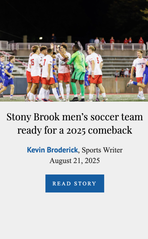 Stony Brook men's soccer team on the field, celebrating or strategizing during a game at night, with spectators in the stands.