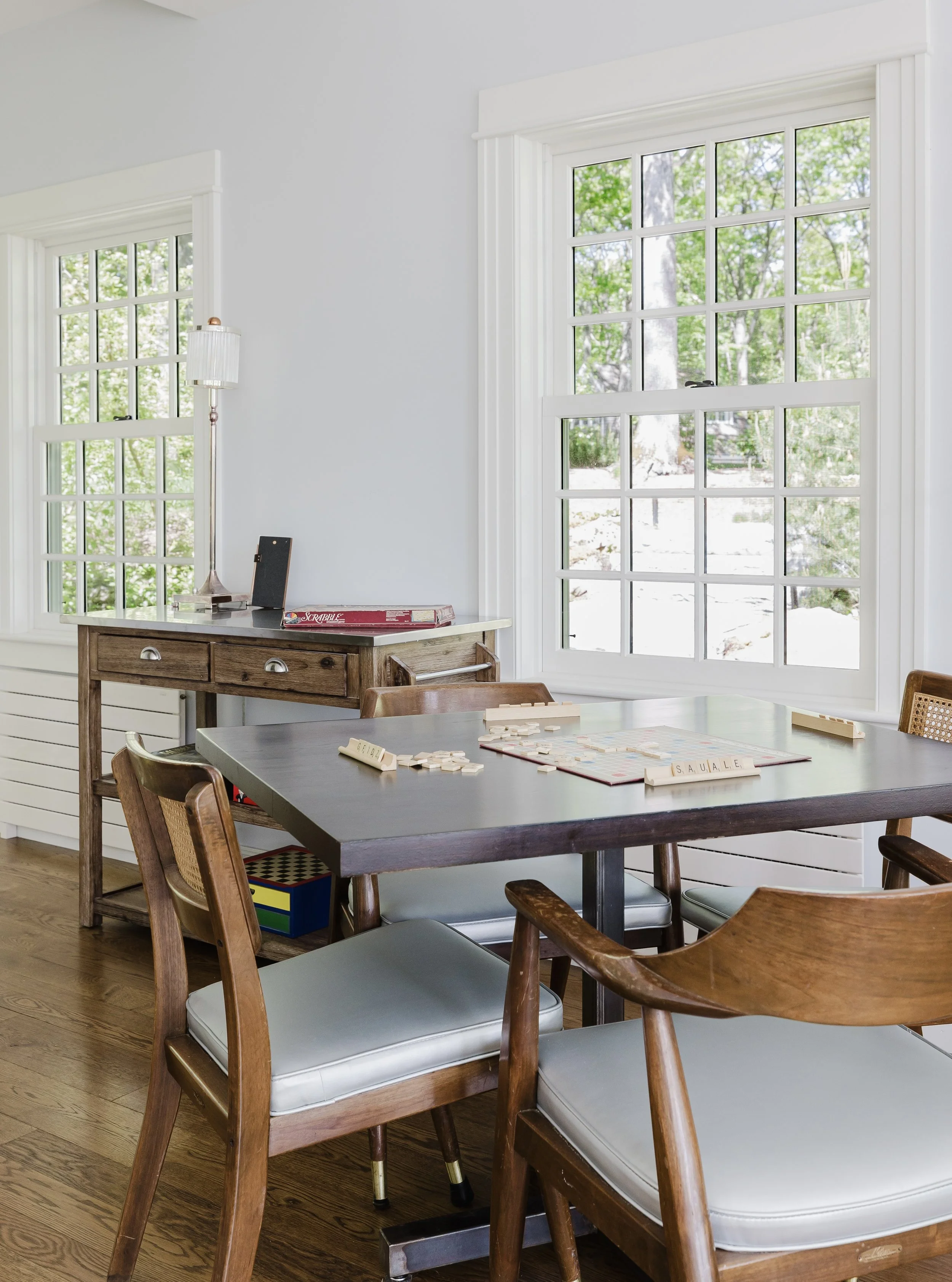 Versatile table near the entry-perfect for puzzles, cards, or a casual breakfast.