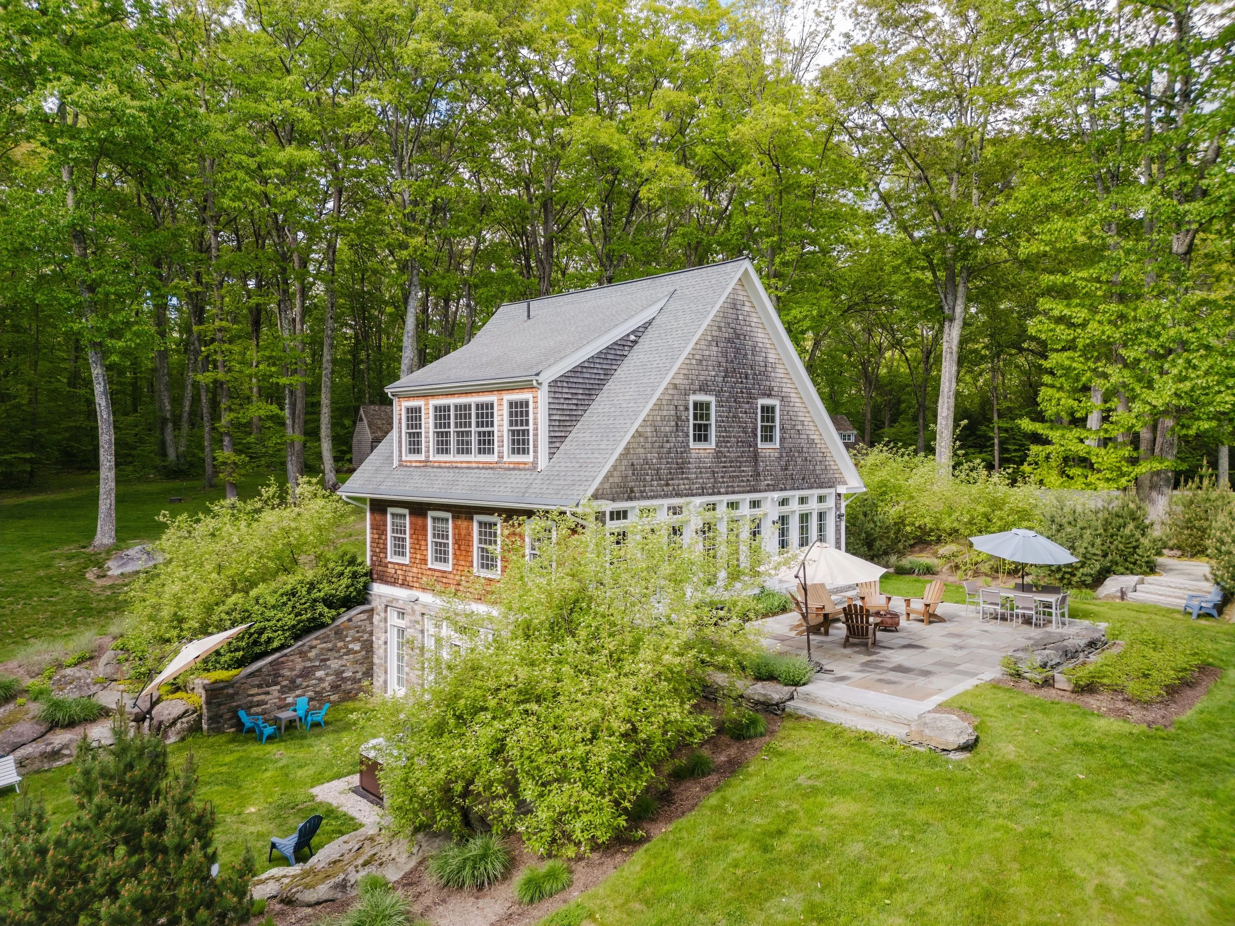 Exterior side of guest house with patio seating