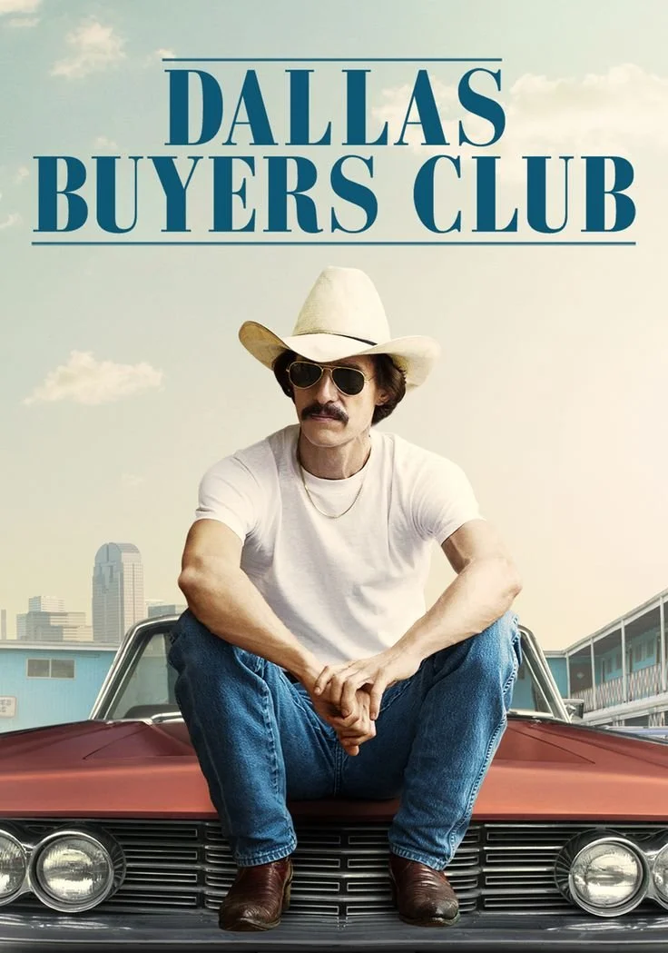 A man in a white cowboy hat, sunglasses, and white T-shirt sitting cross-legged on the hood of a vintage red car, with a city skyline in the background, for the Dallas Buyers Club movie poster.