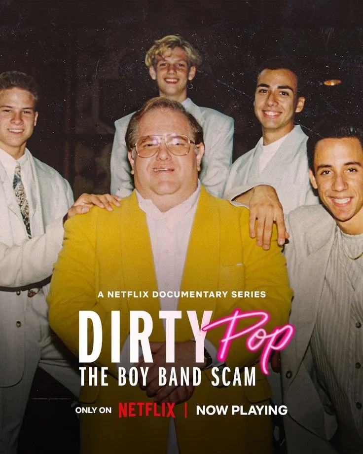 Poster for the Netflix documentary series 'Dirty Pop: The Boy Band Scam' featuring a man in a yellow jacket surrounded by four young men.
