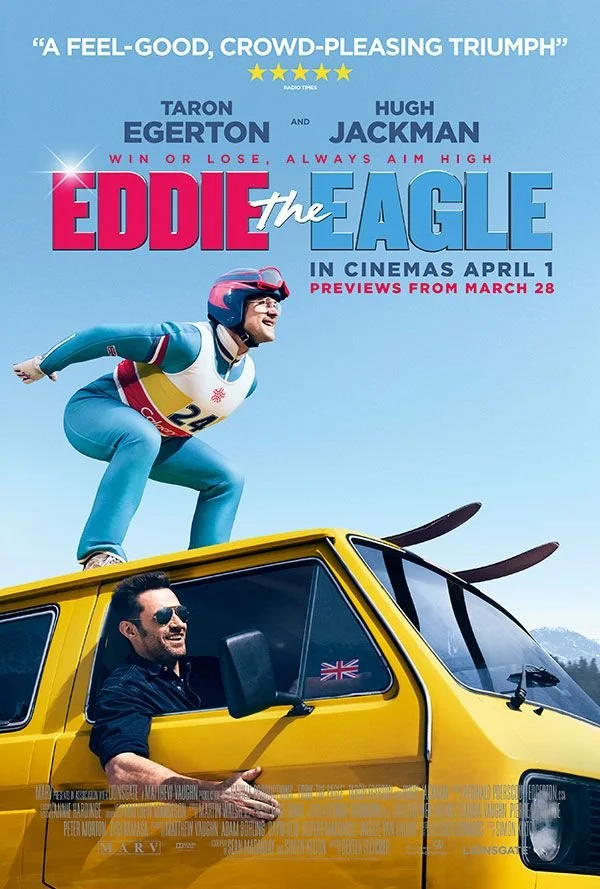 Poster for the movie 'Eddie the Eagle' featuring Taron Egerton as Eddie and Hugh Jackman. The poster shows Eddie in a ski helmet and suit, standing atop a yellow vehicle with the British flag, and Hugh Jackman sitting inside. The background is blue with text about the film's release date and reviews.