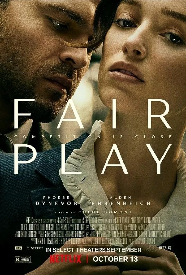 Close-up poster of the movie 'Fair Play' featuring a man and woman with serious expressions. Text includes film title, stars Phoebe Dynevor and Alden Ehrenreich, and release information indicating theatrical release on September 13 and streaming on Netflix.