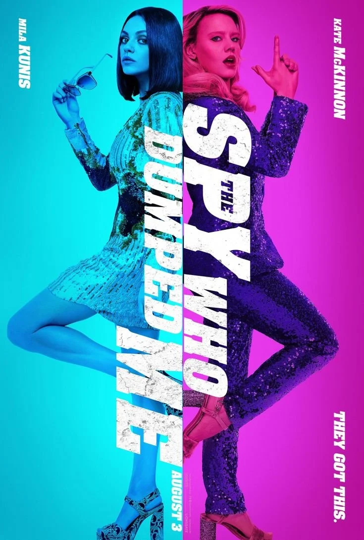 Poster for the movie "The Spy Who Dumped Me" featuring Mila Kunis on the left and Kate McKinnon on the right, with both women dressed in sequined outfits, set against colorful backgrounds.