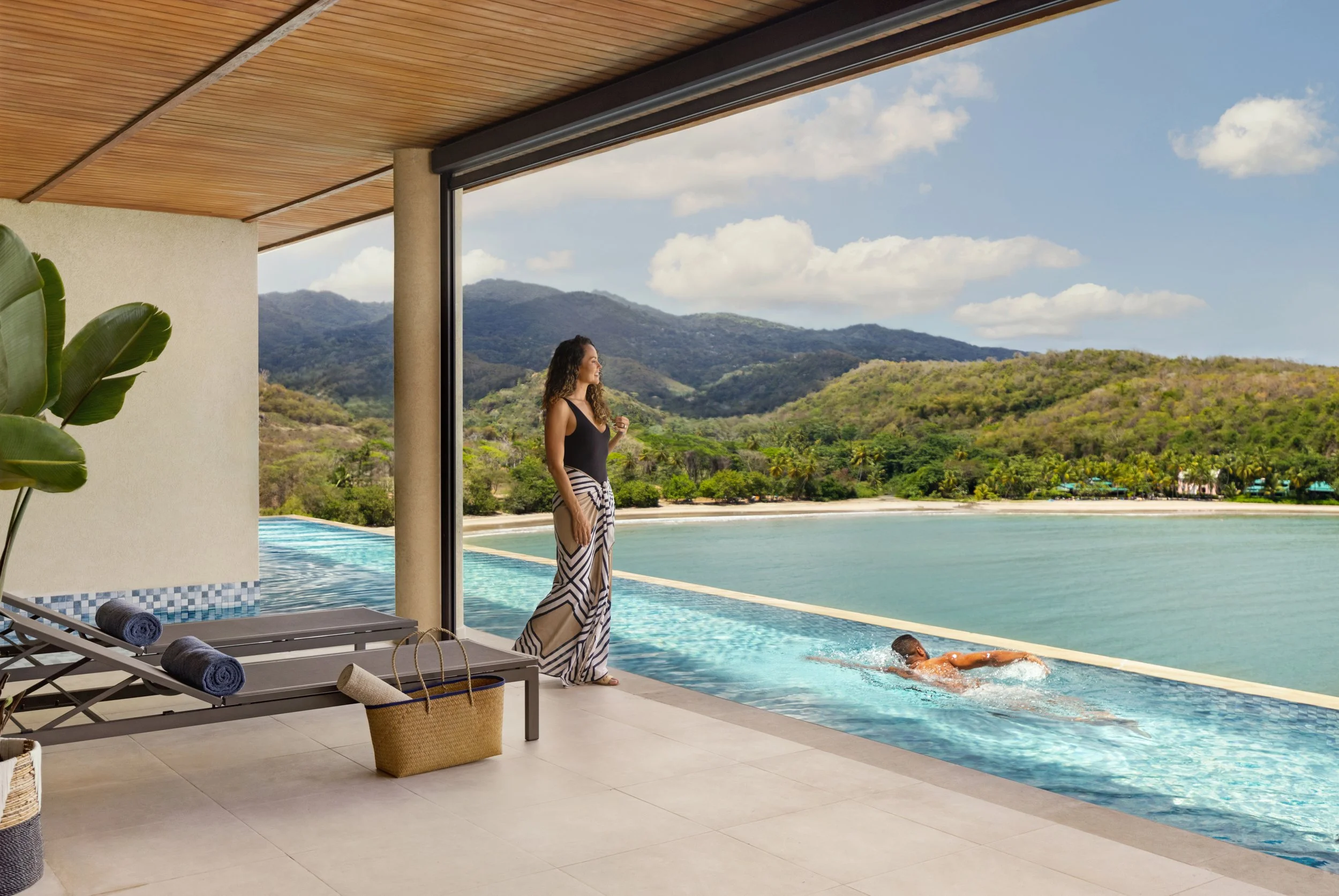 A traveler fully present in an ultra-luxury travel moment.