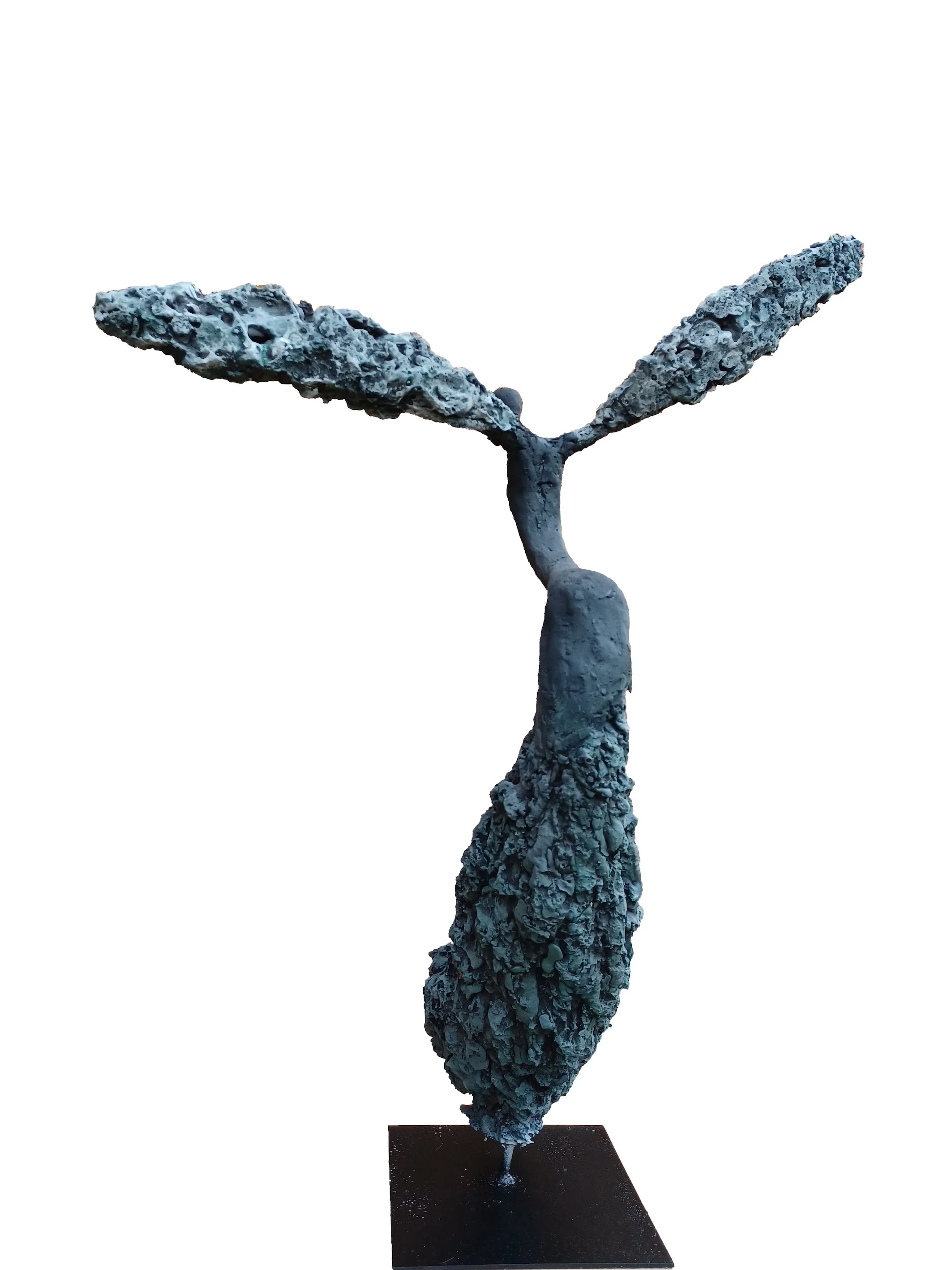 Artistic sculpture resembling a bird, made of textured material with wings spread and a base for support.