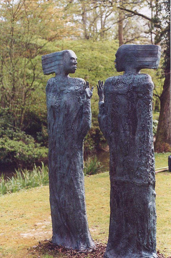 A figurative sculpture exploring simplified form and emotional presence, inspired by the storytelling traditions of the Nigerian Delta.