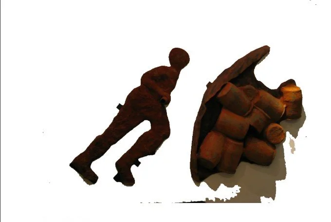 A figurative sculpture exploring simplified form and emotional presence, inspired by the storytelling traditions of the Nigerian Delta.