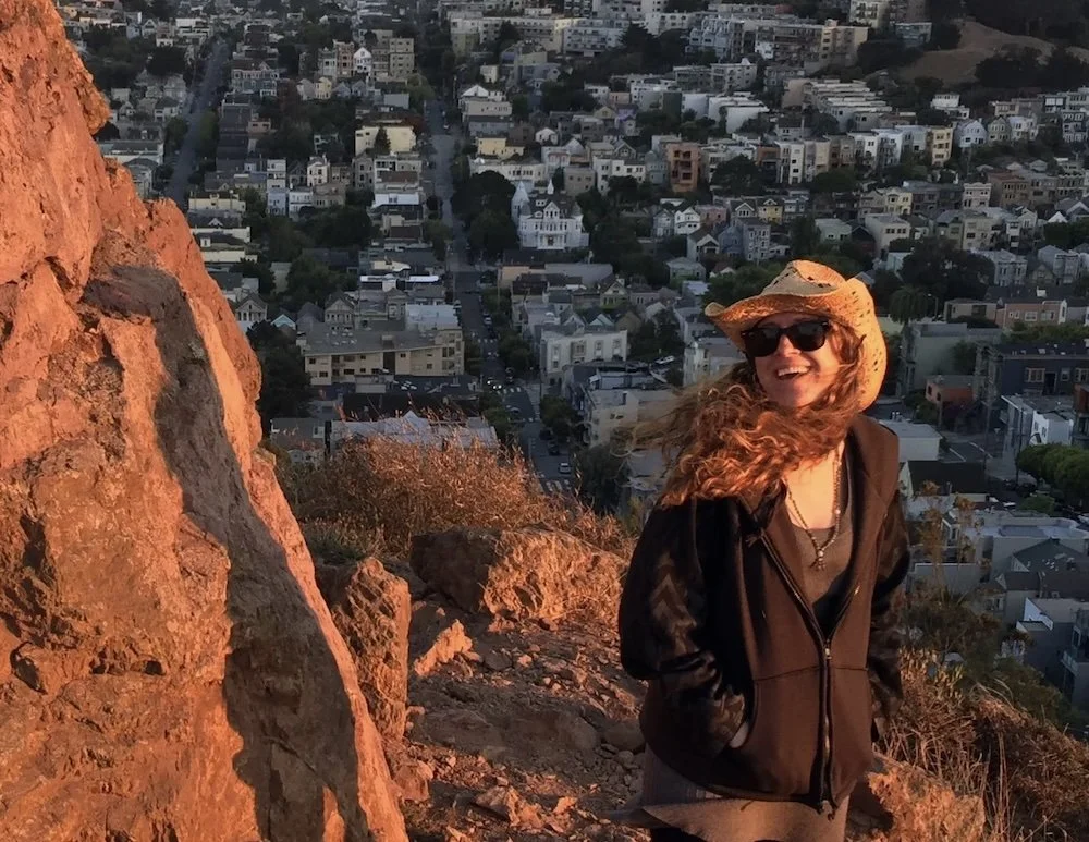 Tommi standing at Corona Heights