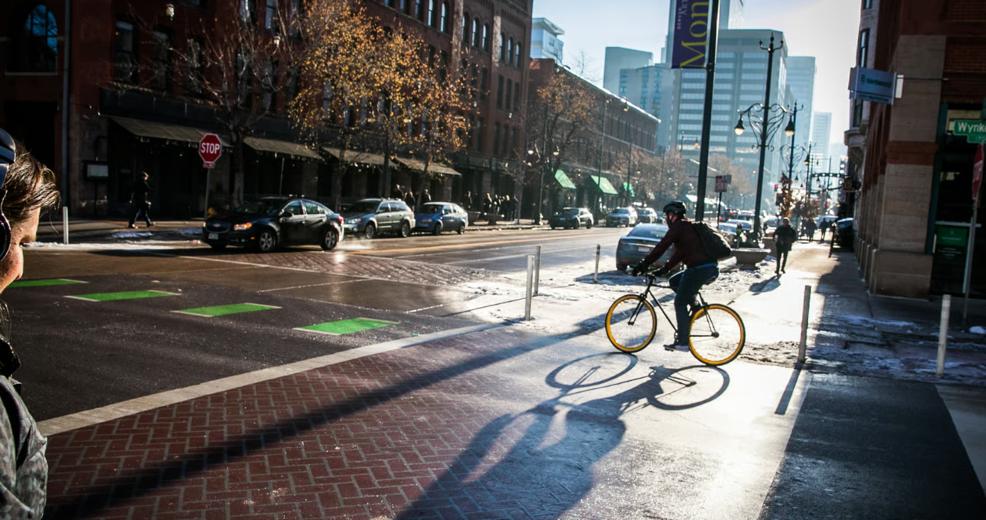 CPR News: Black and brown riders say Colorado’s stop sign bill would keep them safer from cars and police