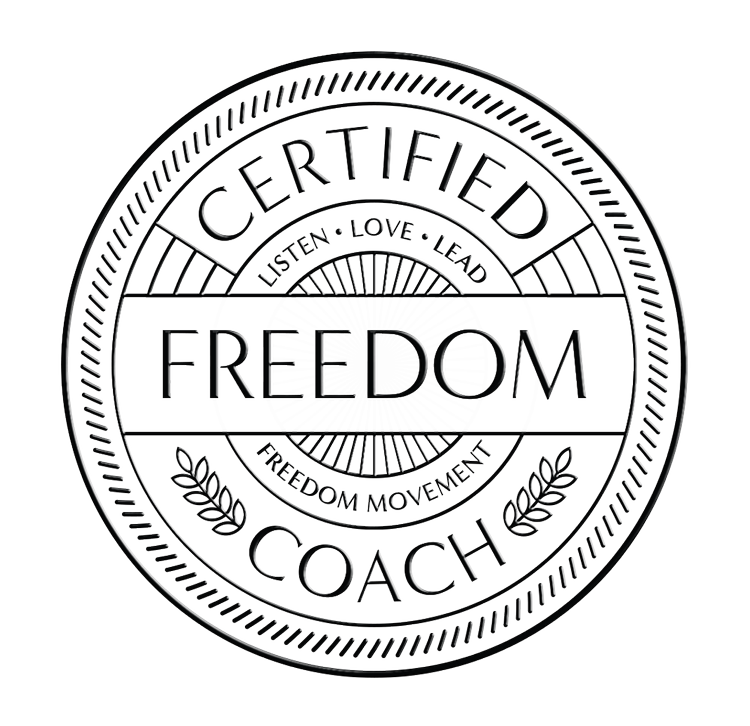 A circle emblem with the words 'CERTIFIED' at the top, 'COACH' at the bottom, and 'FREEDOM' in the center. Surrounding the central word are the phrases 'LISTEN, LOVE, LEAD' and 'FREEDOM MOVEMENT.' The emblem features decorative laurel branches on eit