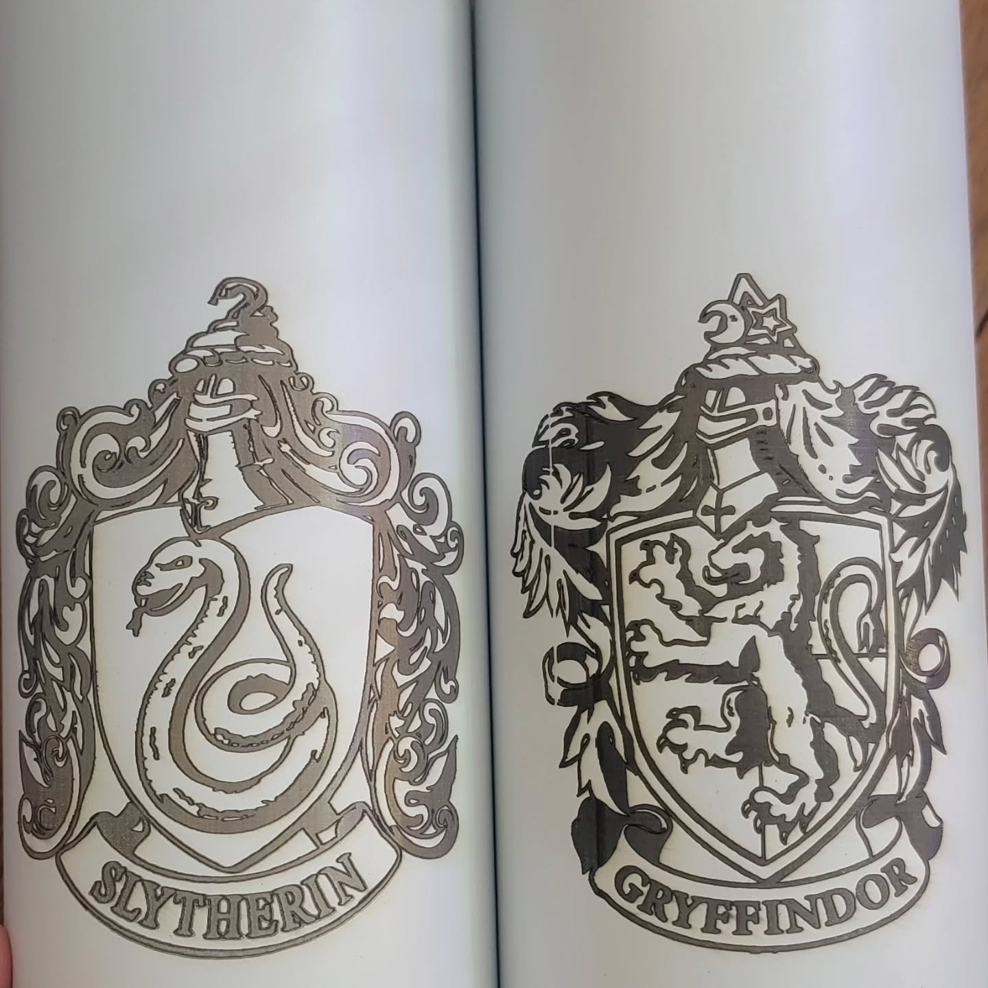 Laser engraving custom tumblers with Harry Potter crest